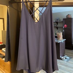 Lush blue tank top with crossing straps!